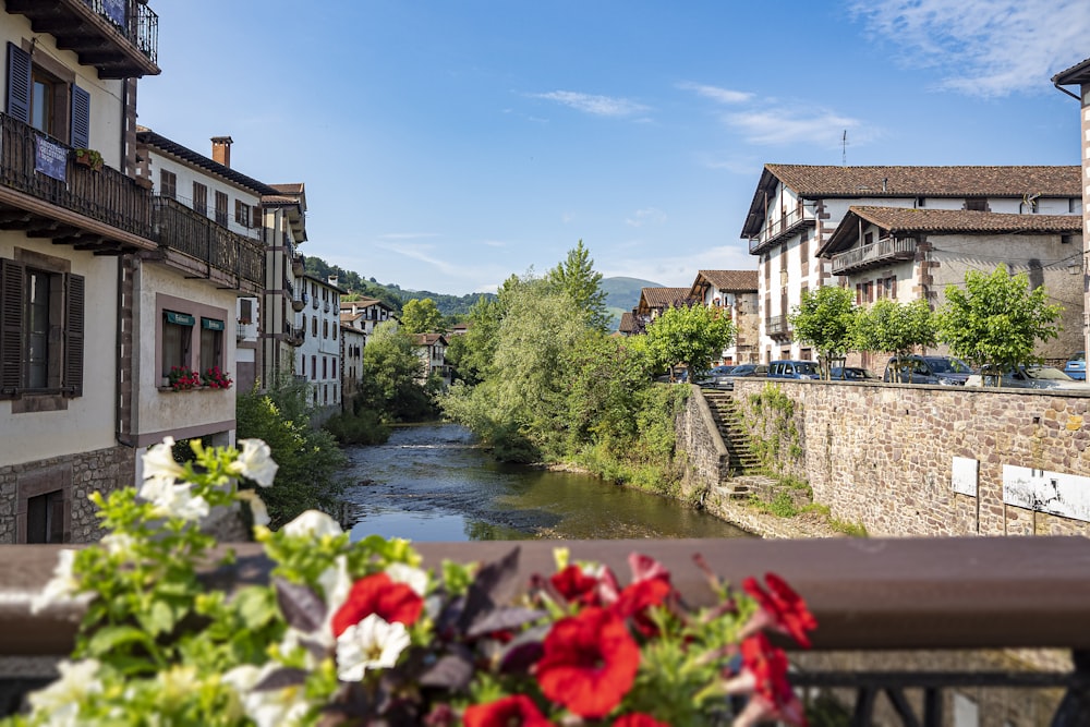 a view of a river running through a town