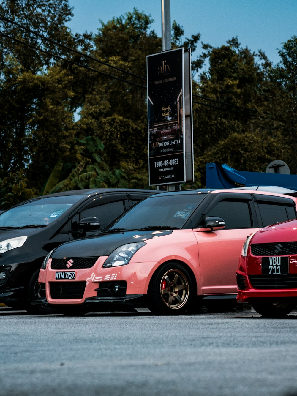 a group of cars parked next to each other