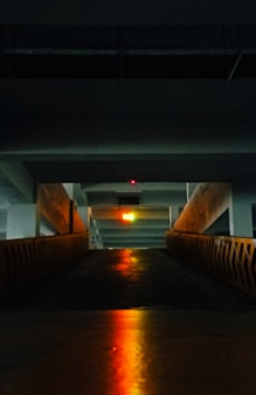 Traffic light system managing vehicle flow in a parking area.