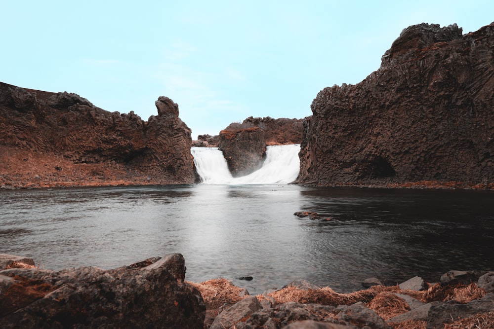 a large body of water surrounded by rocks