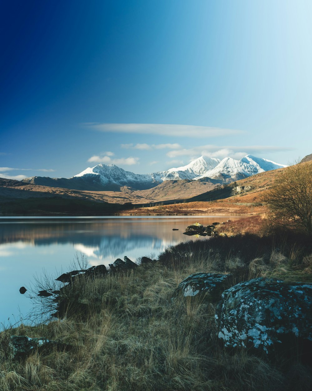 a large body of water surrounded by mountains