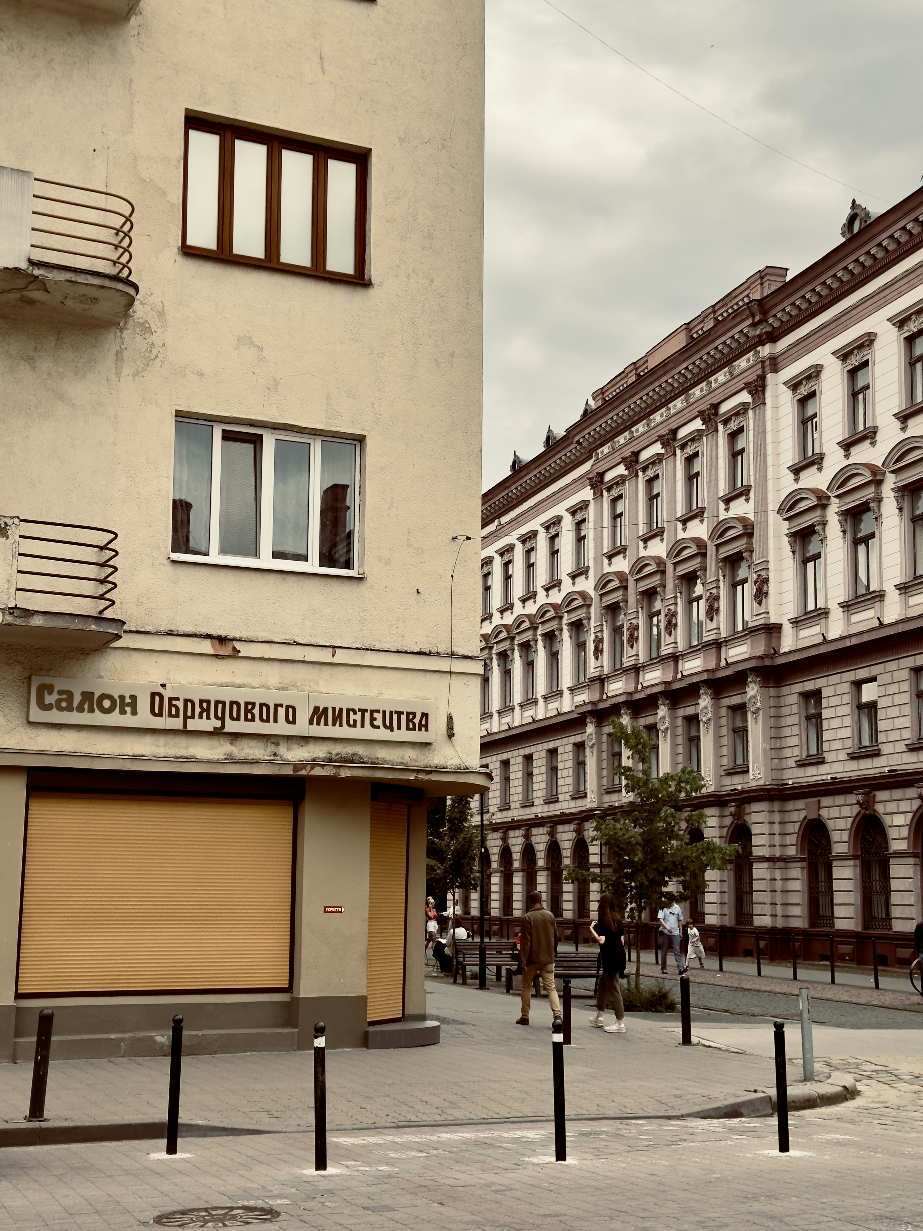 a row of buildings on a city street