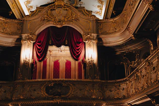 Close-up of elegant golden ticket details with deep purple hues and subtle lighting