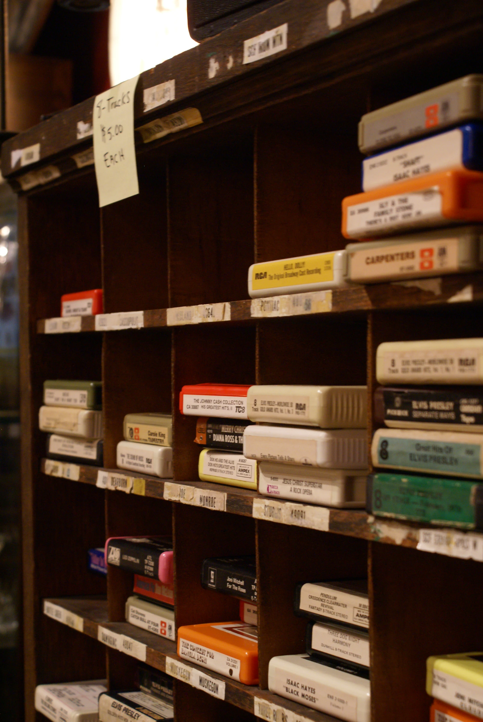 A book shelf filled with lots of books