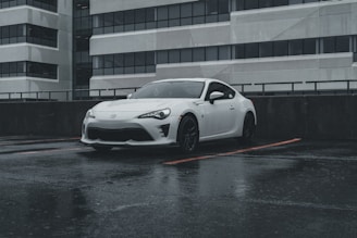 A sleek Toyota Yaris parked in an urban setting.