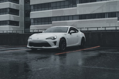 A sleek Toyota Yaris parked in an urban setting.