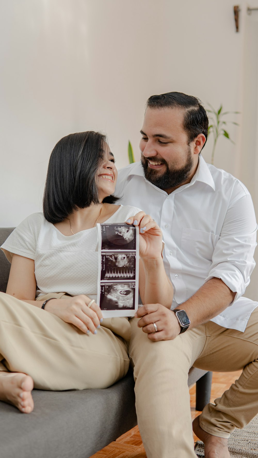 a man and a woman sitting on a couch