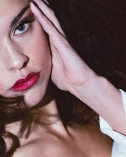 Before and after makeup look highlighting the transformative power of vibrant lipstick