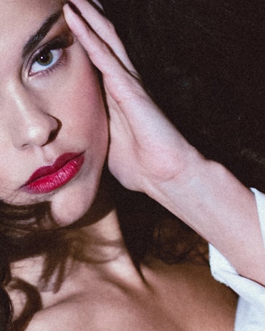 Before and after makeup look highlighting the transformative power of vibrant lipstick