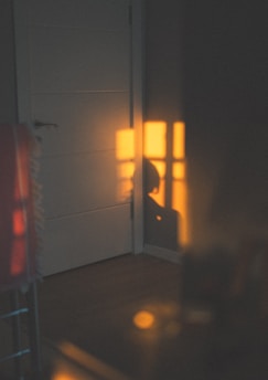 A cozy family home bathed in warm sunlight, symbolizing stability and security.