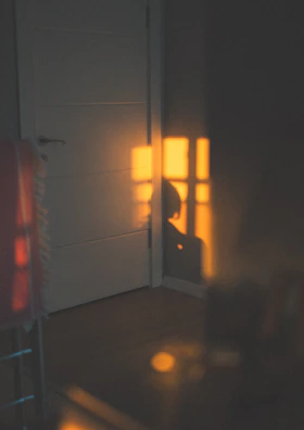Warm golden sunlight casting a tranquil glow on a meditative figure.