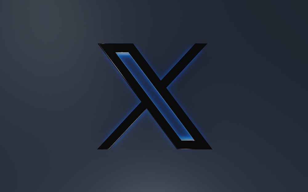 the letter x is illuminated in blue light