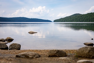 a large body of water surrounded by rocks