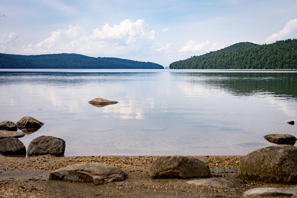 a large body of water surrounded by rocks