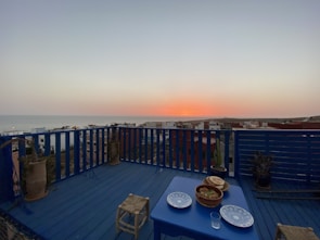 Balcony view overlooking Phoenix cityscape at sunset, perfect for remote work breaks.