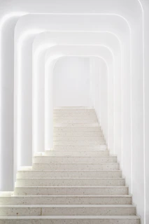 Elegant architectural lighting highlighting a minimalist staircase in a modern home.