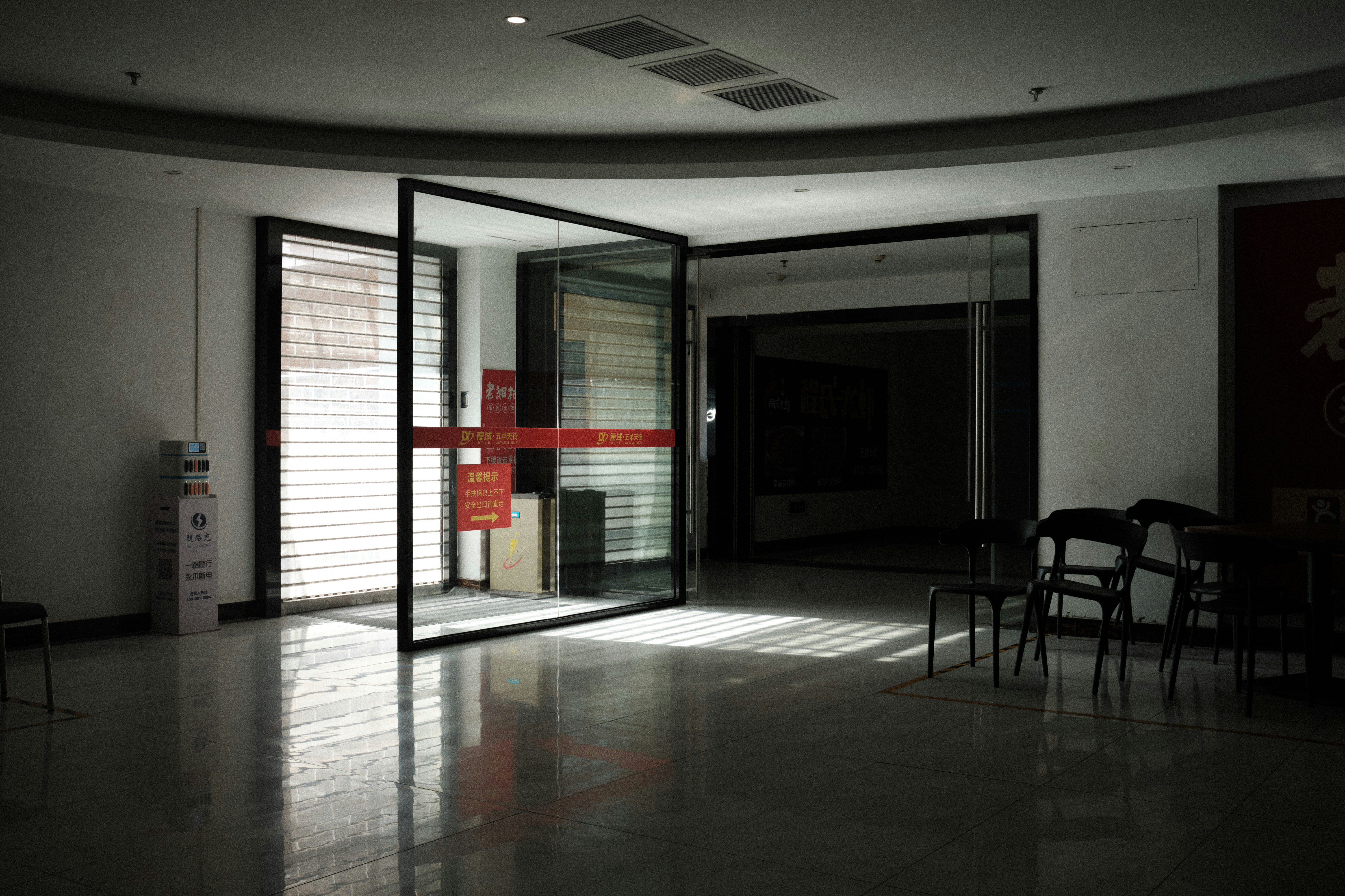 a room that has a bunch of chairs in it