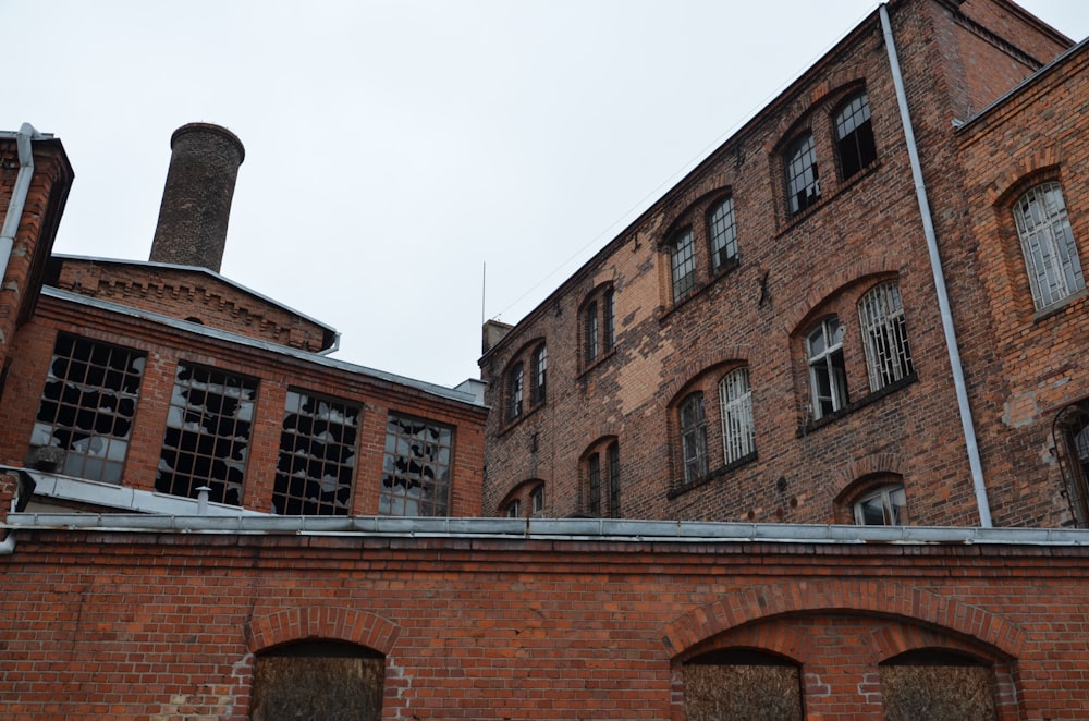 a brick building with a clock tower on top of it