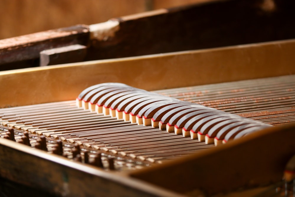 a close up of a musical instrument with strings