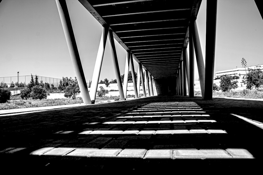 a black and white photo of a bridge