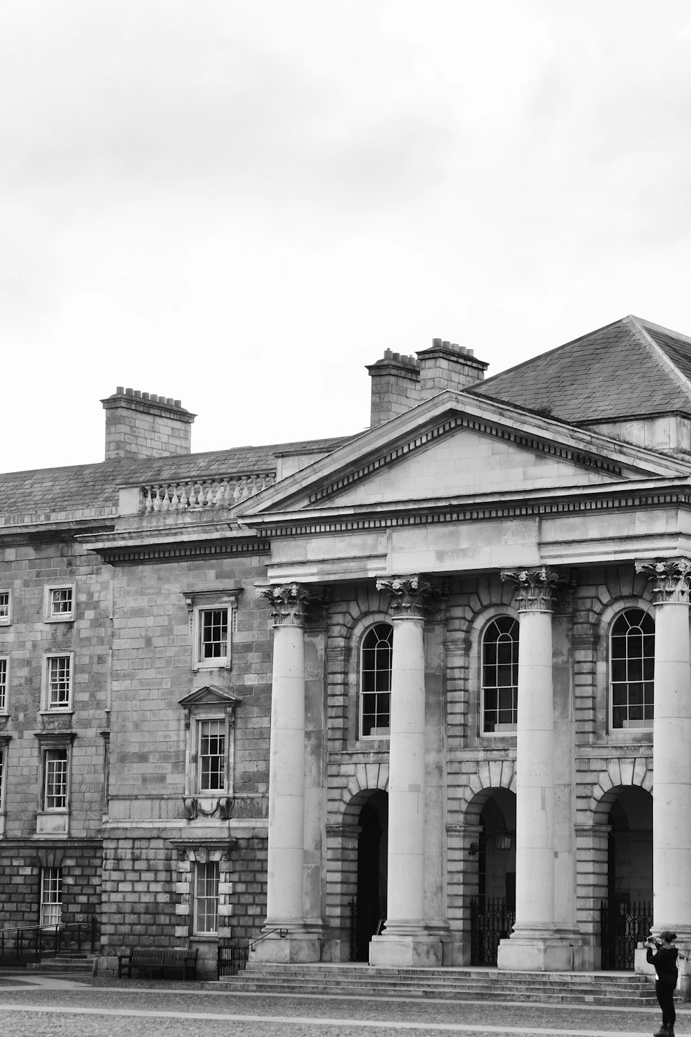 a black and white photo of a large building