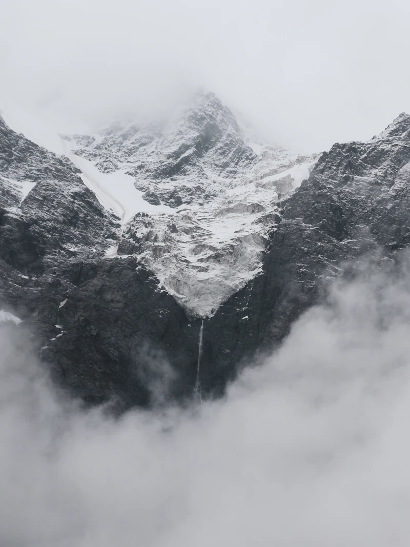 Snow-covered Himalayan peaks in cloud