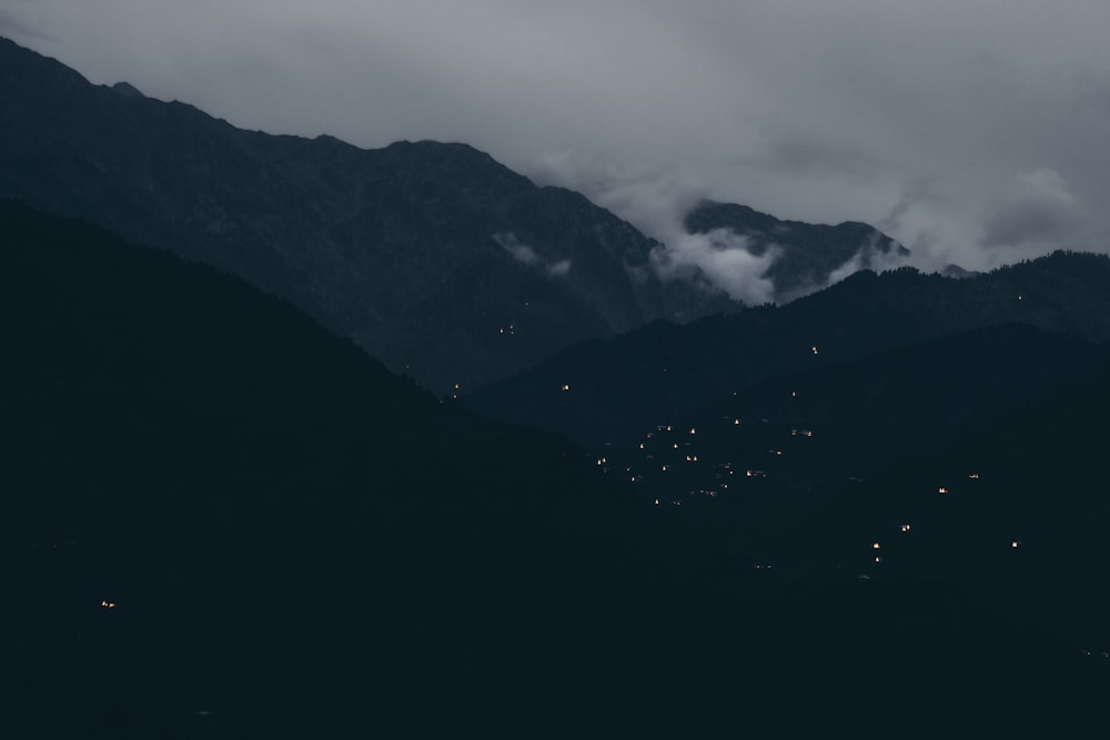 a view of a mountain range at night