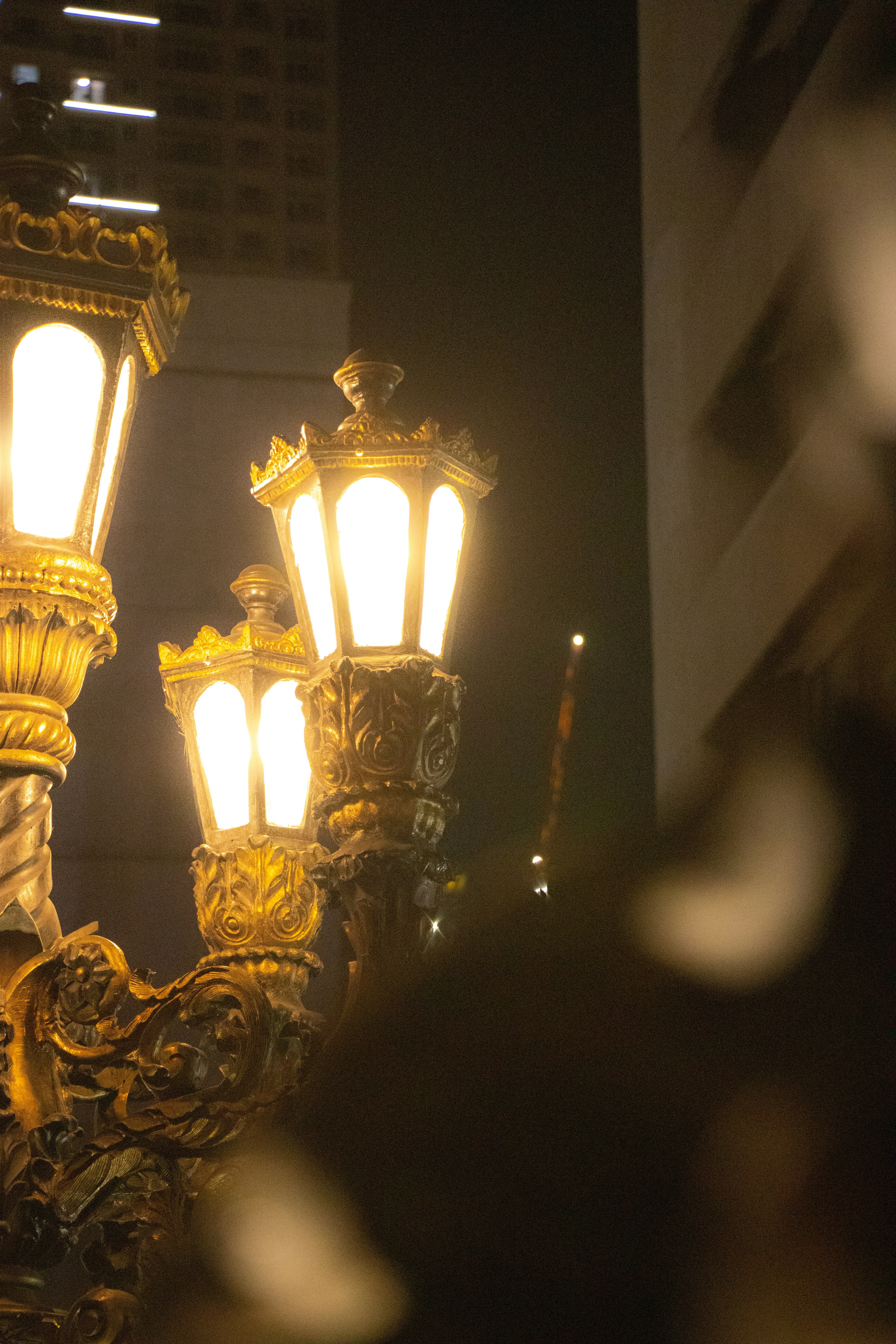 a couple of lights that are on a pole