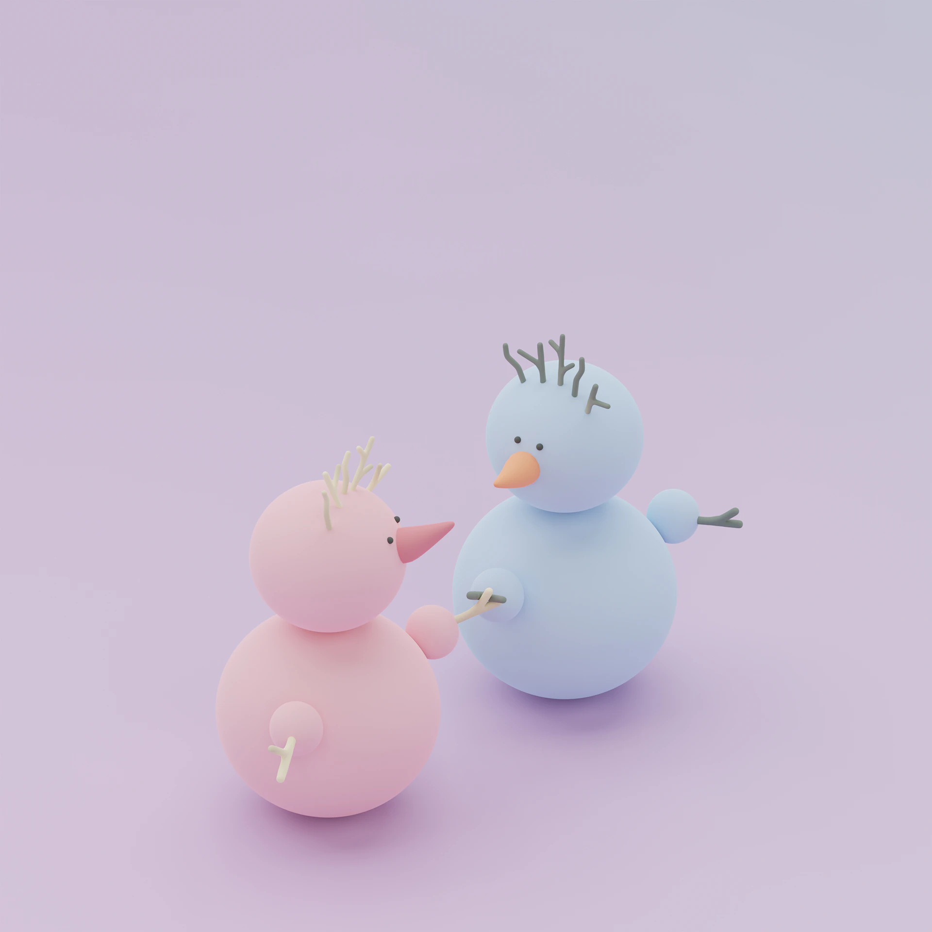 a couple of small toys sitting next to each other