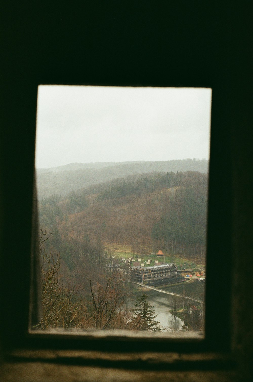 a view of a river from a window in a building