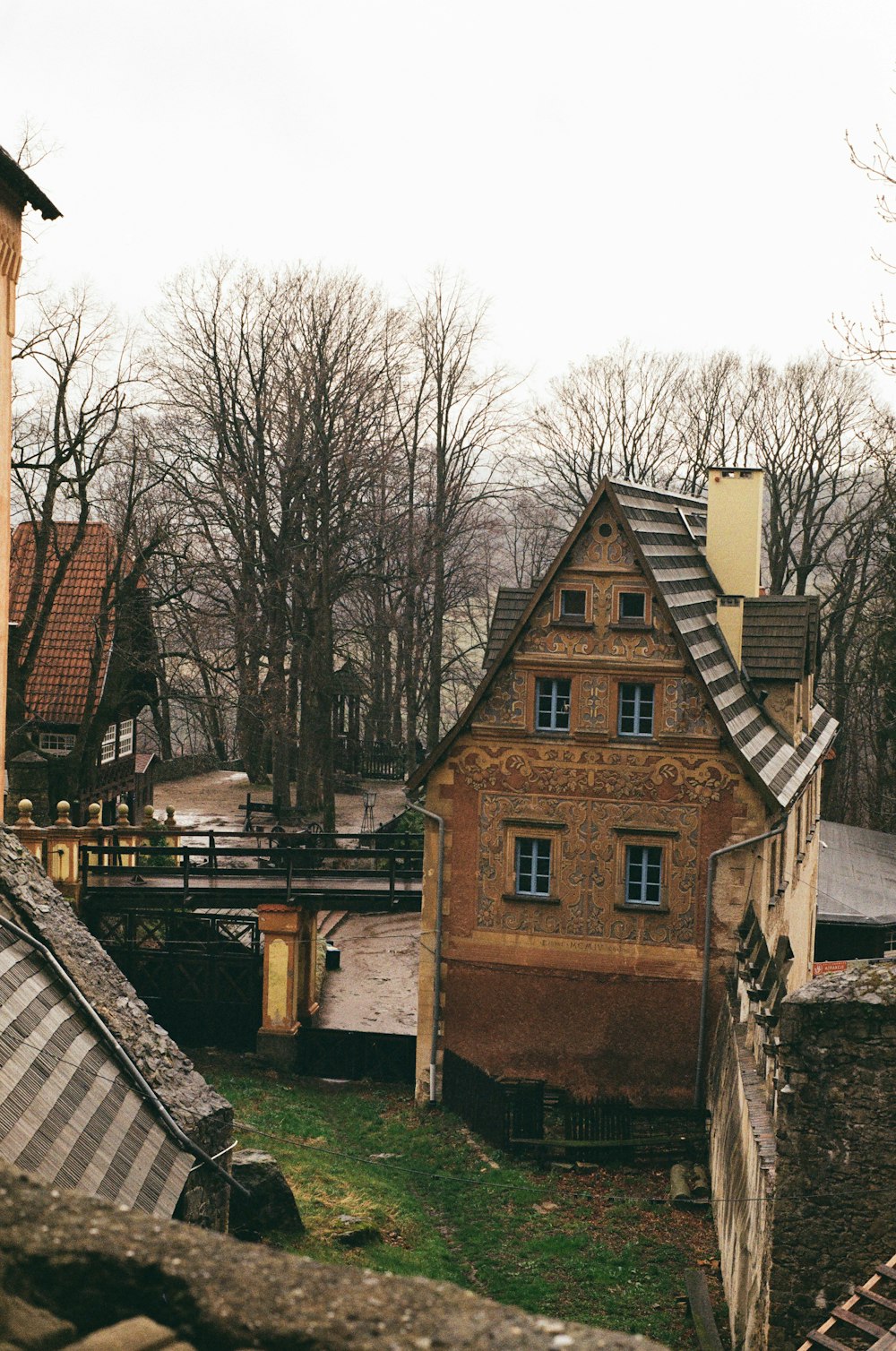 an old building with a clock on the side of it