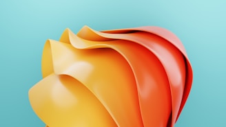 Close-up of a smooth, flowing sculpture with soft shadows and vibrant yellow highlights.