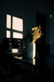An elegant living room with glassmorphism effects and soft shadows highlighting premium furniture.