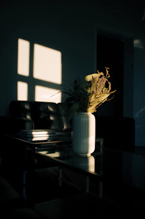 An elegant living room with glassmorphism effects and soft shadows highlighting premium furniture.