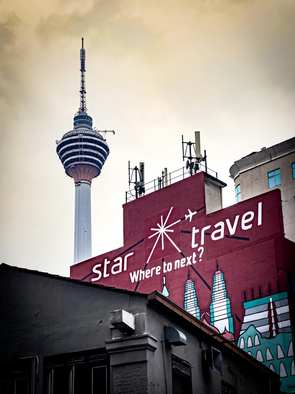 a building with a sign that says star travel where to next?