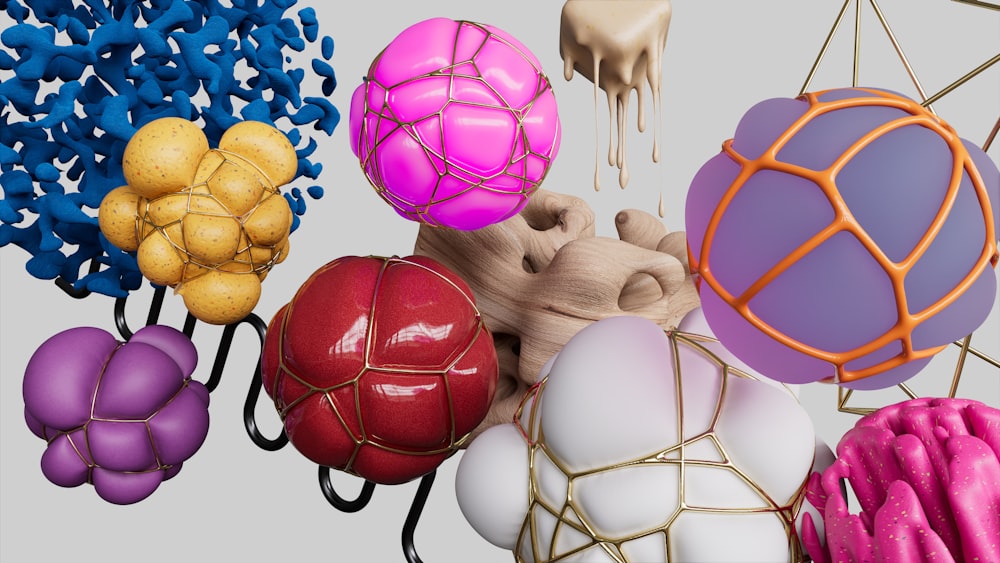 a bunch of different colored balls in a cage