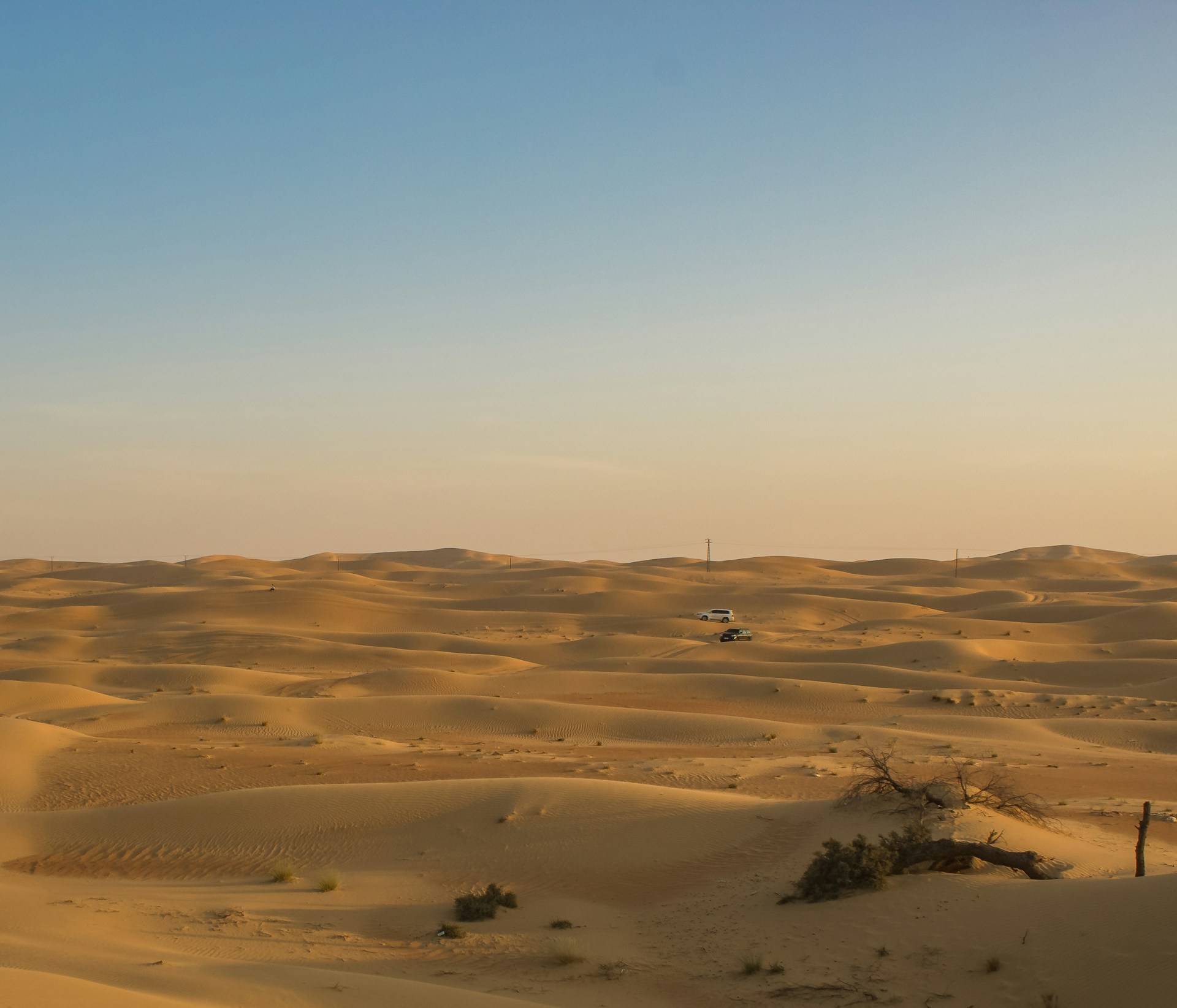 a truck is driving through the desert