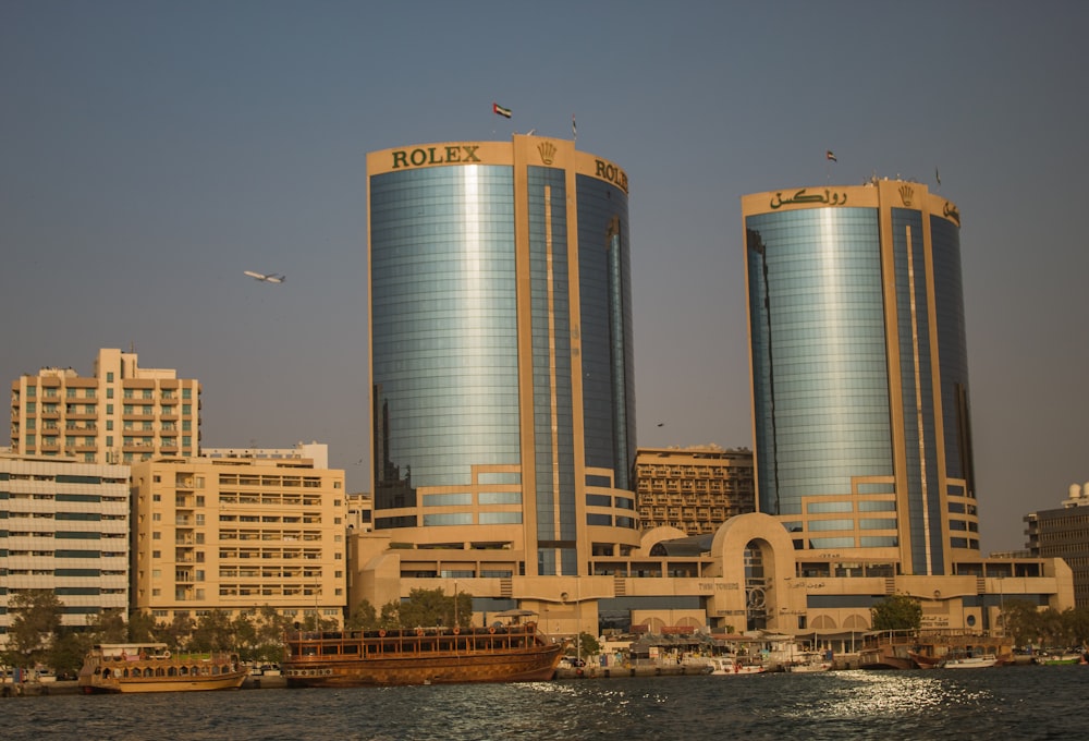 a large body of water in front of tall buildings