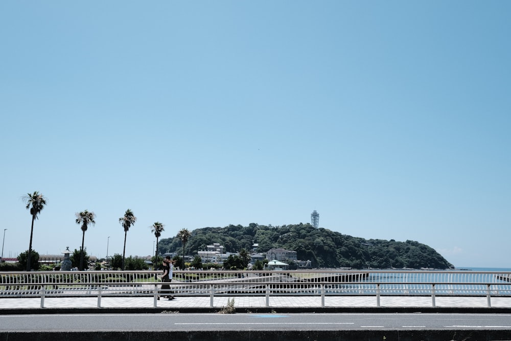 a person riding a skateboard on a city street