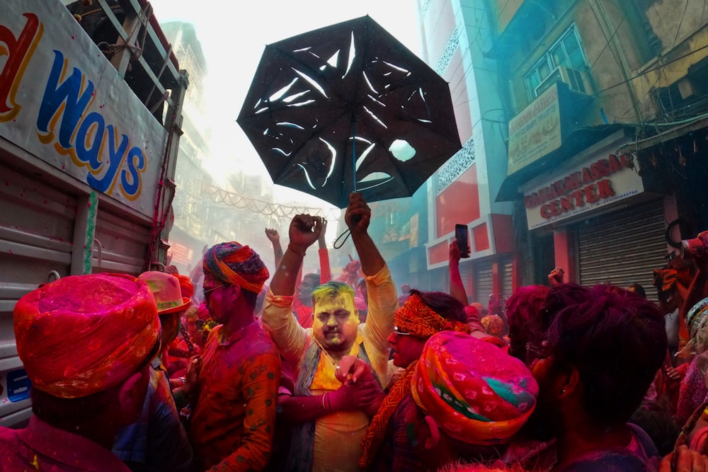 a group of people with colored paint on their faces