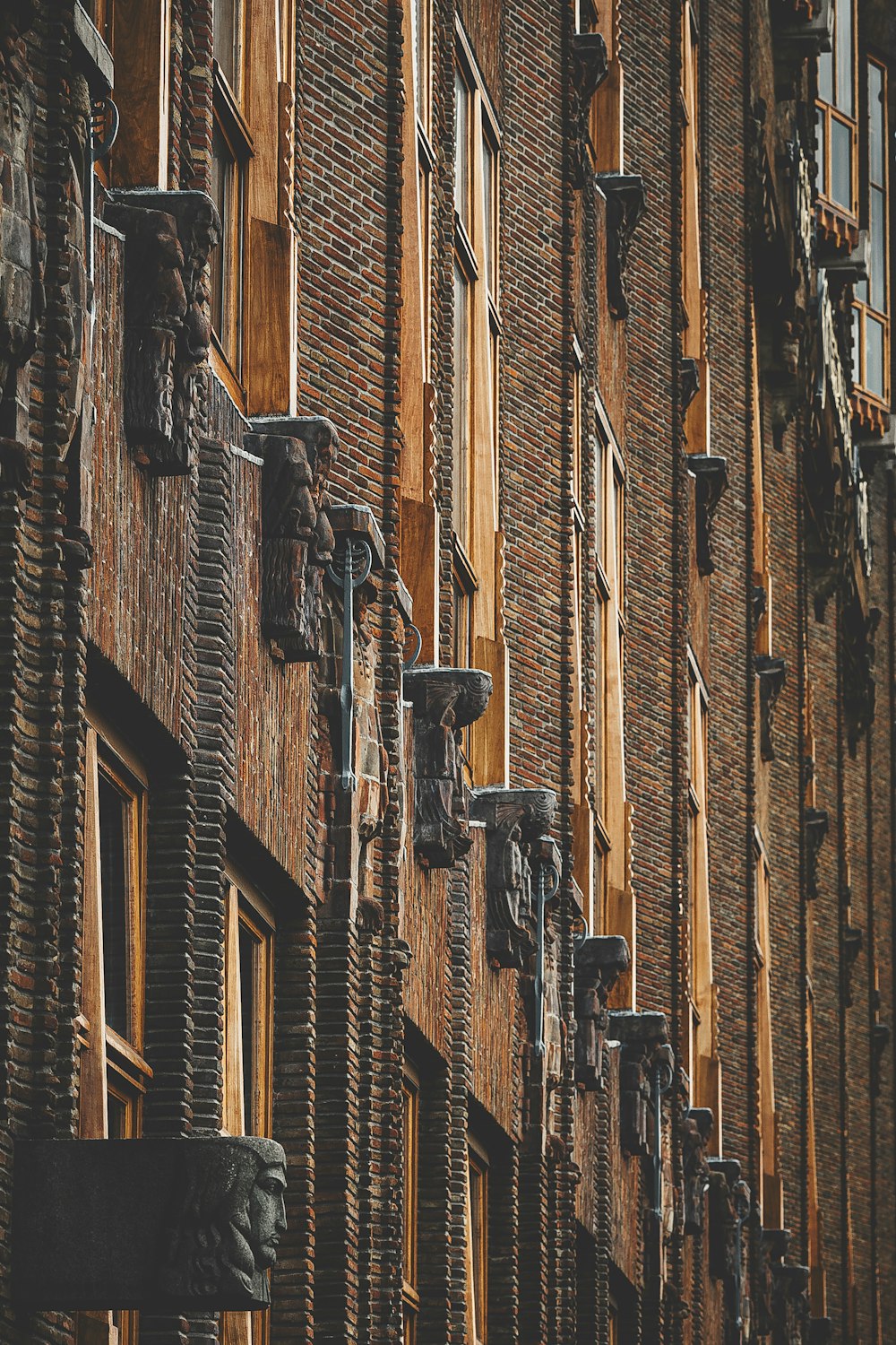 a row of windows on a brick building