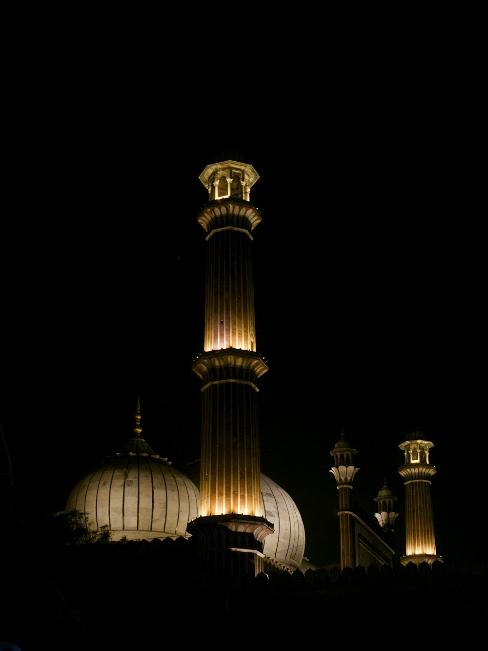 a tall tower with a clock on top of it