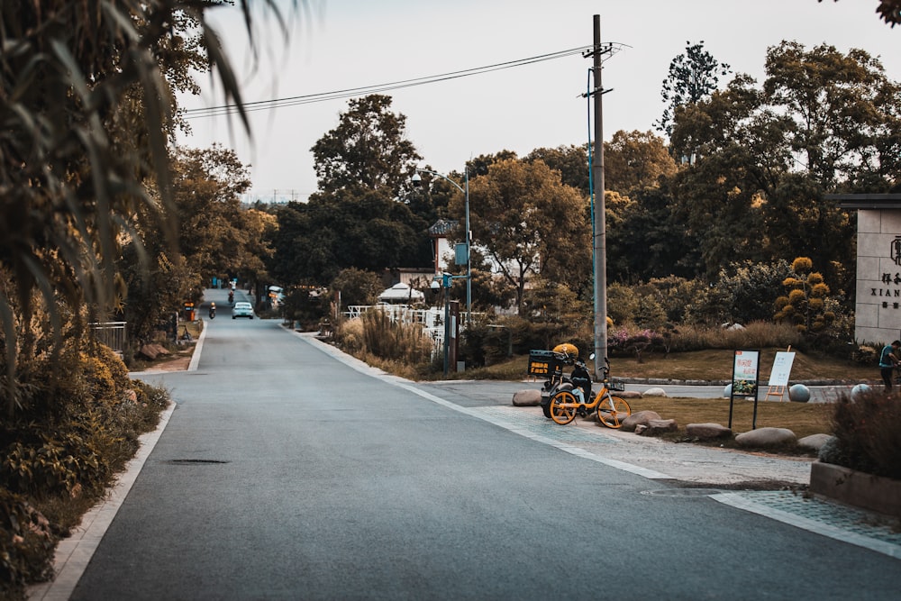 a motorcycle parked on the side of a road