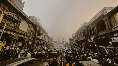 Bustling city street in Vizag, showing local markets and colorful shops.