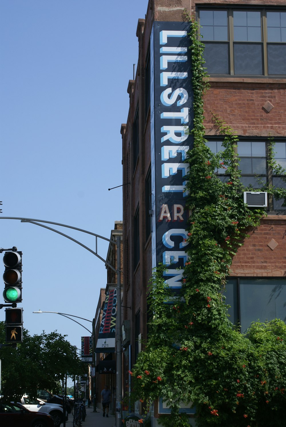 a tall building with a sign on the side of it