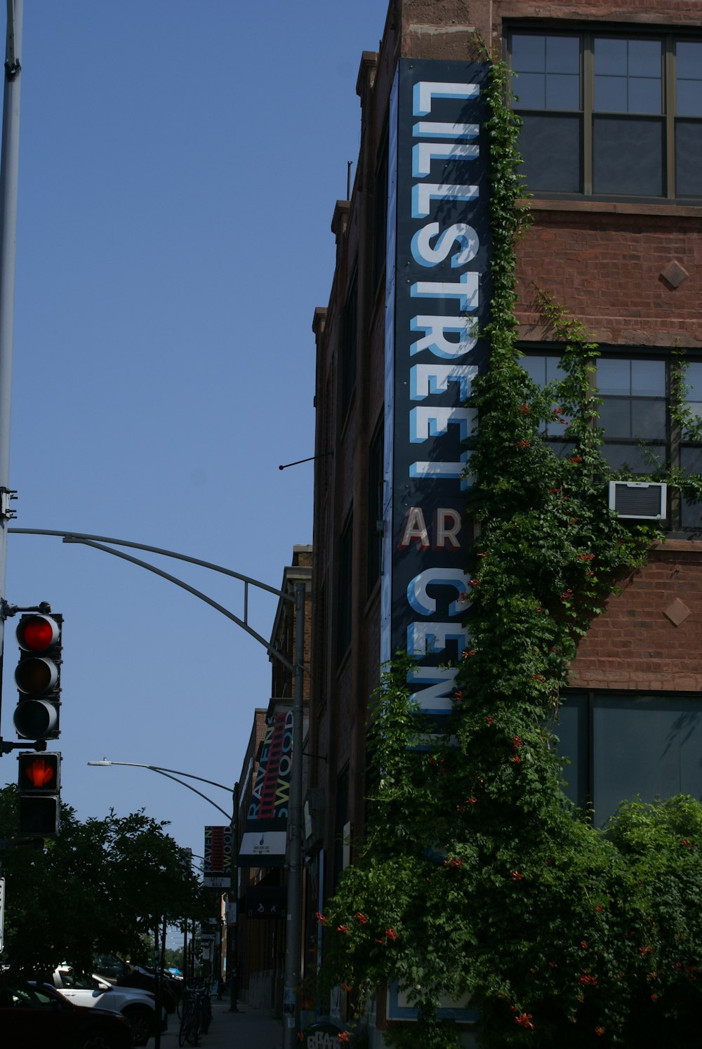 a tall building with a sign on the side of it