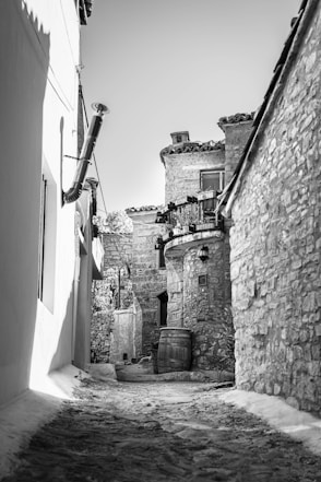 black and white photograph of a narrow alleyway