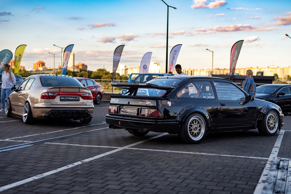 a couple of cars parked in a parking lot