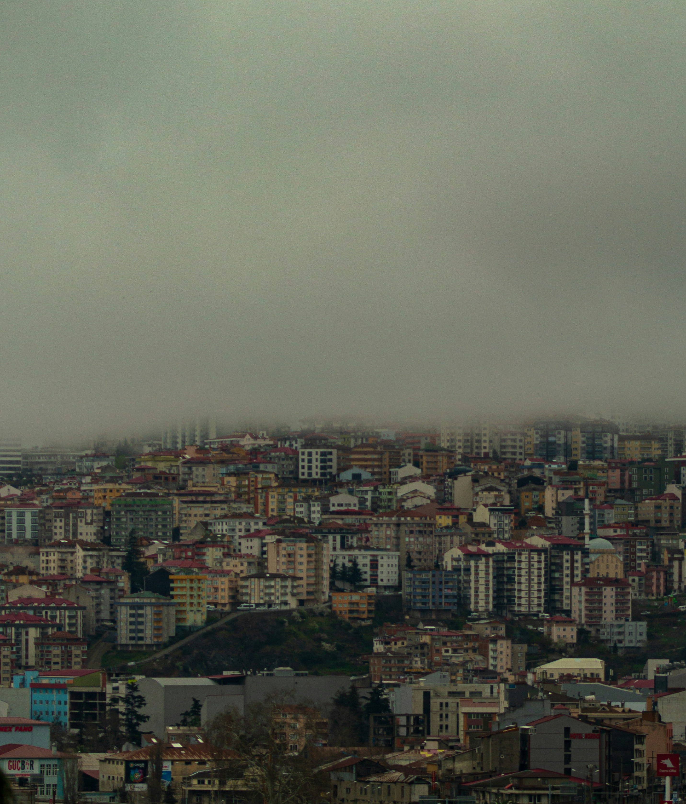a view of a city from a hill