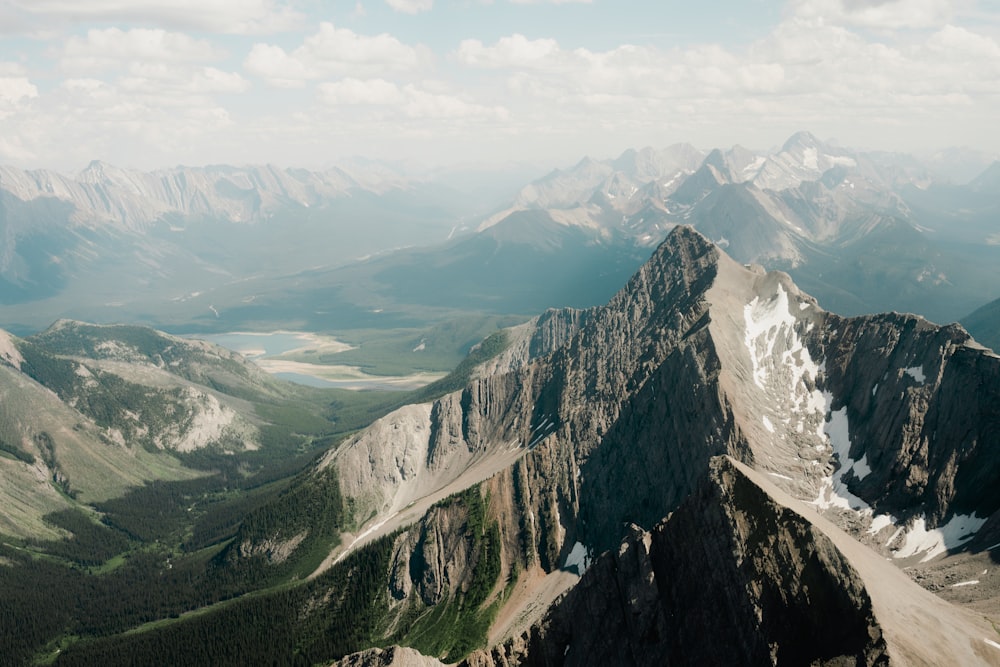 a view of a mountain range from the top of a mountain